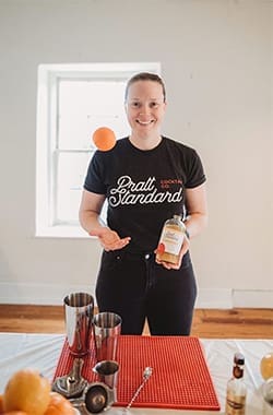 Tory Pratt with an orange